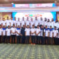 Bupati Kotabaru melalui Staf Ahli, Forkopimda, dan pengurus baru Karang Taruna periode 2025–2030 berfoto bersama usai prosesi pengukuhan di Aula Bamega.