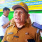 Kepala Diskoperindag Kotabaru, Risa Ahyani, memberikan keterangan terkait jumlah kios terdampak kebakaran Pasar Kemakmuran.