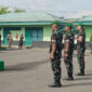 Komandan Kodim 1004/Kotabaru, Letkol Inf Cecep Cahyadi, menyampaikan amanat kepada personel baru Yonif TP 884/Saijaan pada acara tradisi penerimaan di halaman eks Makodim Lama. 